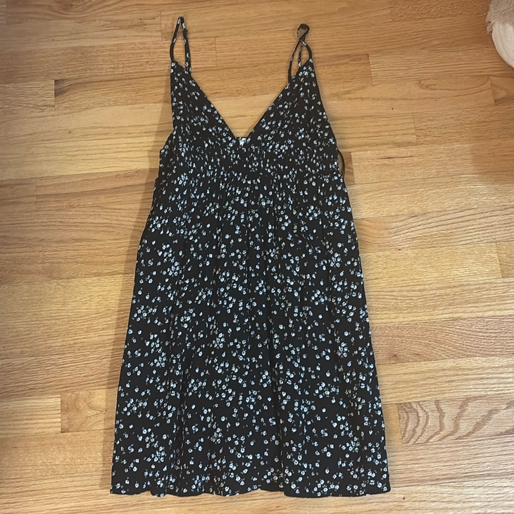 Medium sized black dress with floral pattern from Garage